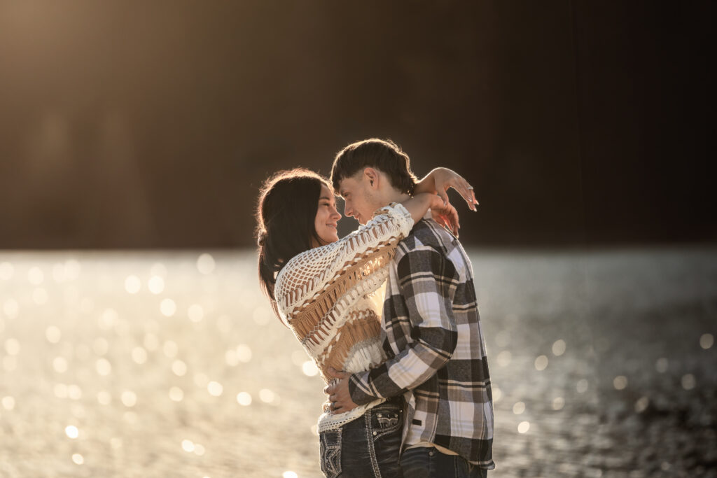 couple embracing at Rattlesnake Lake photoshoot during golden hour